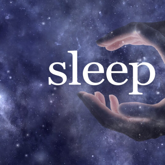So you want to sleep and you need help - ethereal partial transparent female hands cupped around the word SLEEP against a dark blue cosmic starry night sky background with copy space