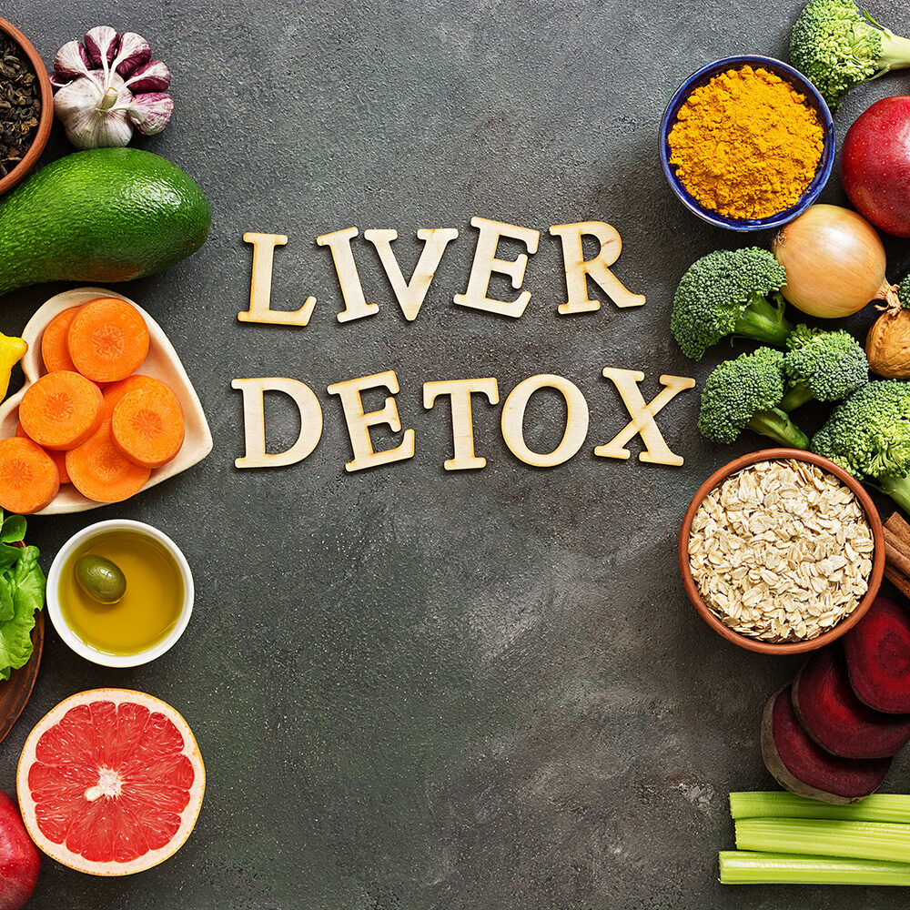 Liver detox diet food concept. Healthy eating concept for the liver, fruits,vegetables, nuts, olive oil, citrus fruits, green tea, turmeric, oats. Top view, flat lay